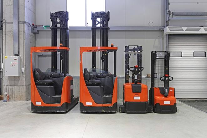 forklifts transporting goods in a distribution center